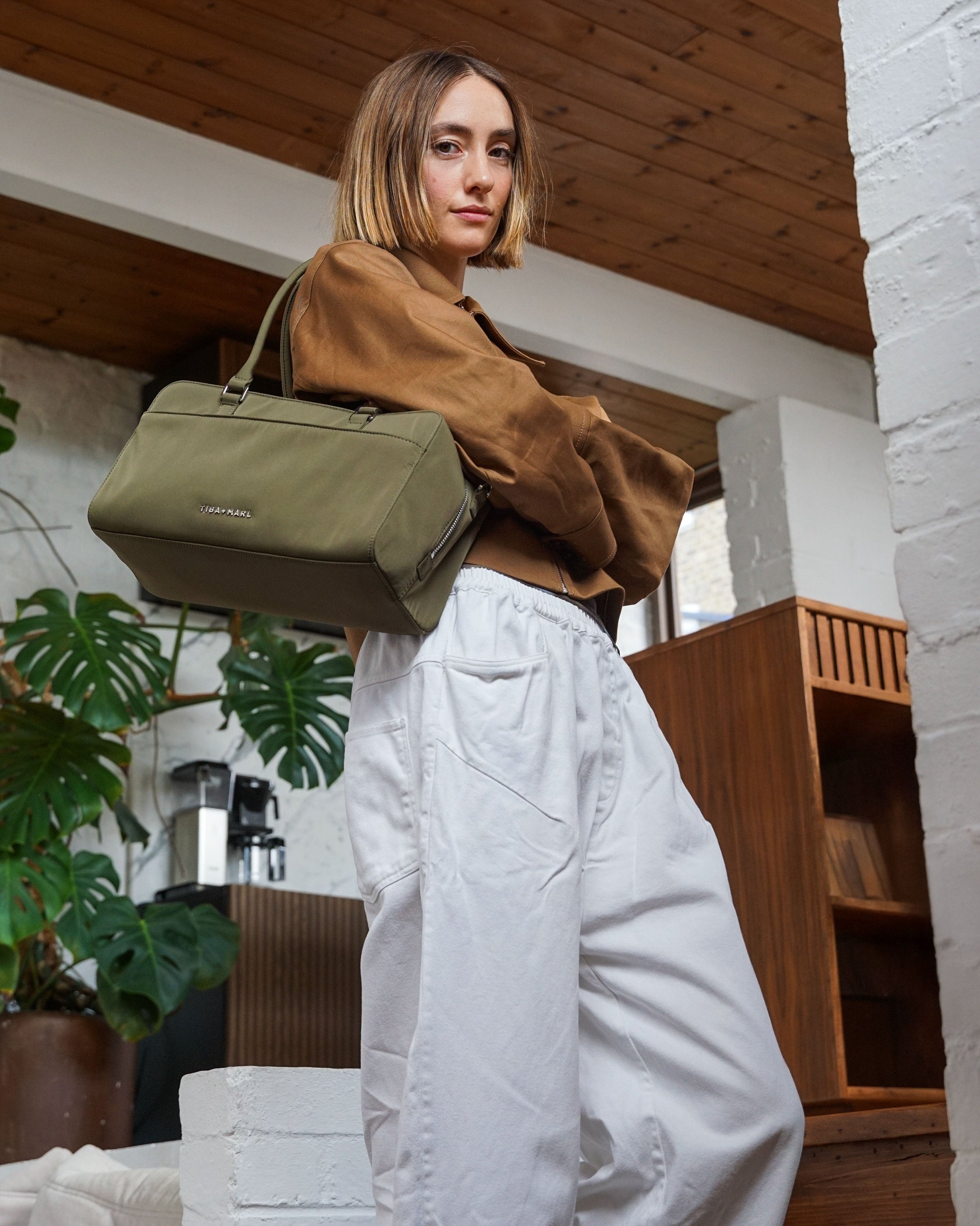 Riley Compact East-West Changing Bag Olive Woven